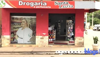 Drogaria e Perfumaria Santa Luzia - Sra. De Oliveira - Mg